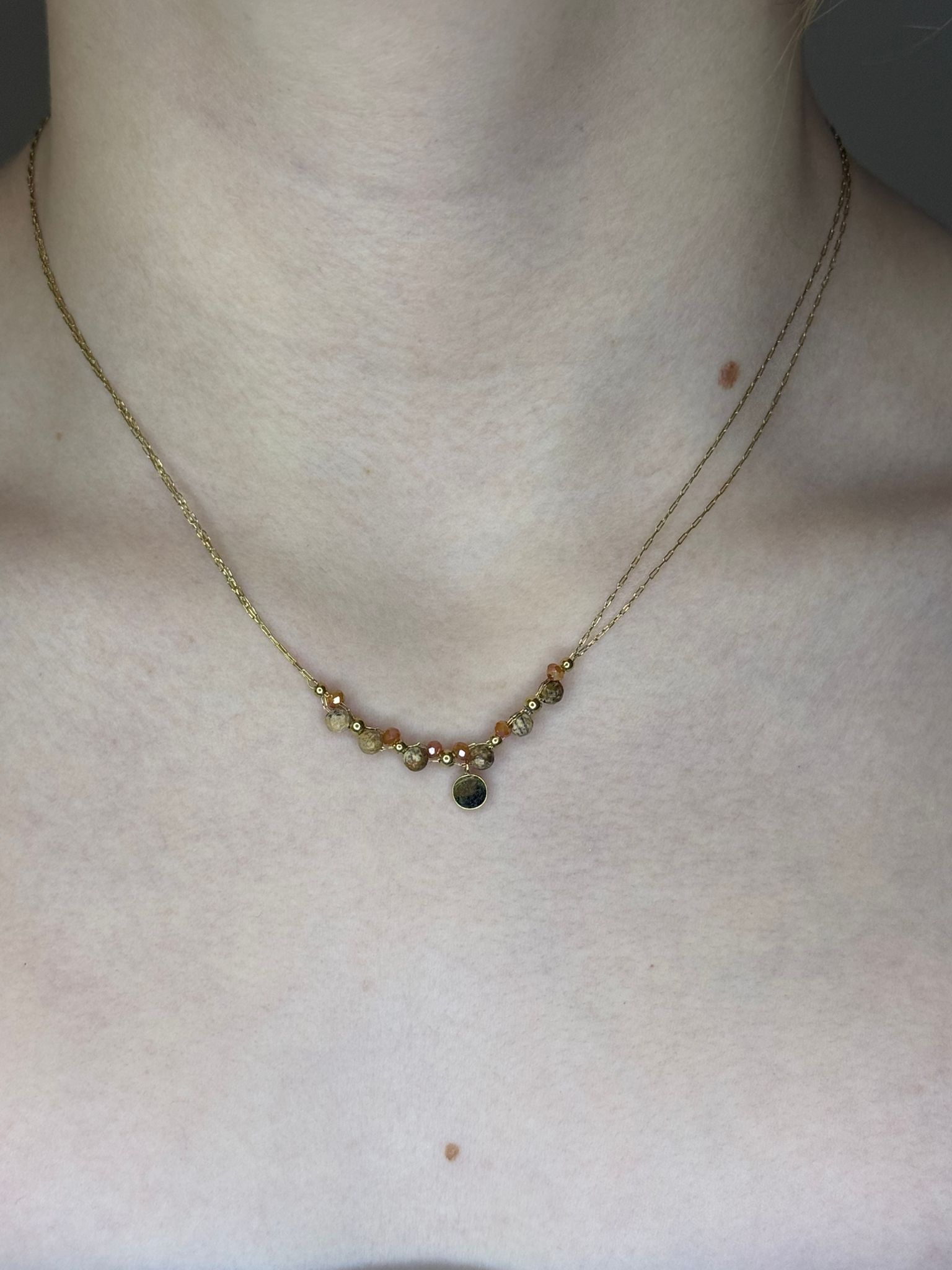 Collier avec perle beige Nakupenda